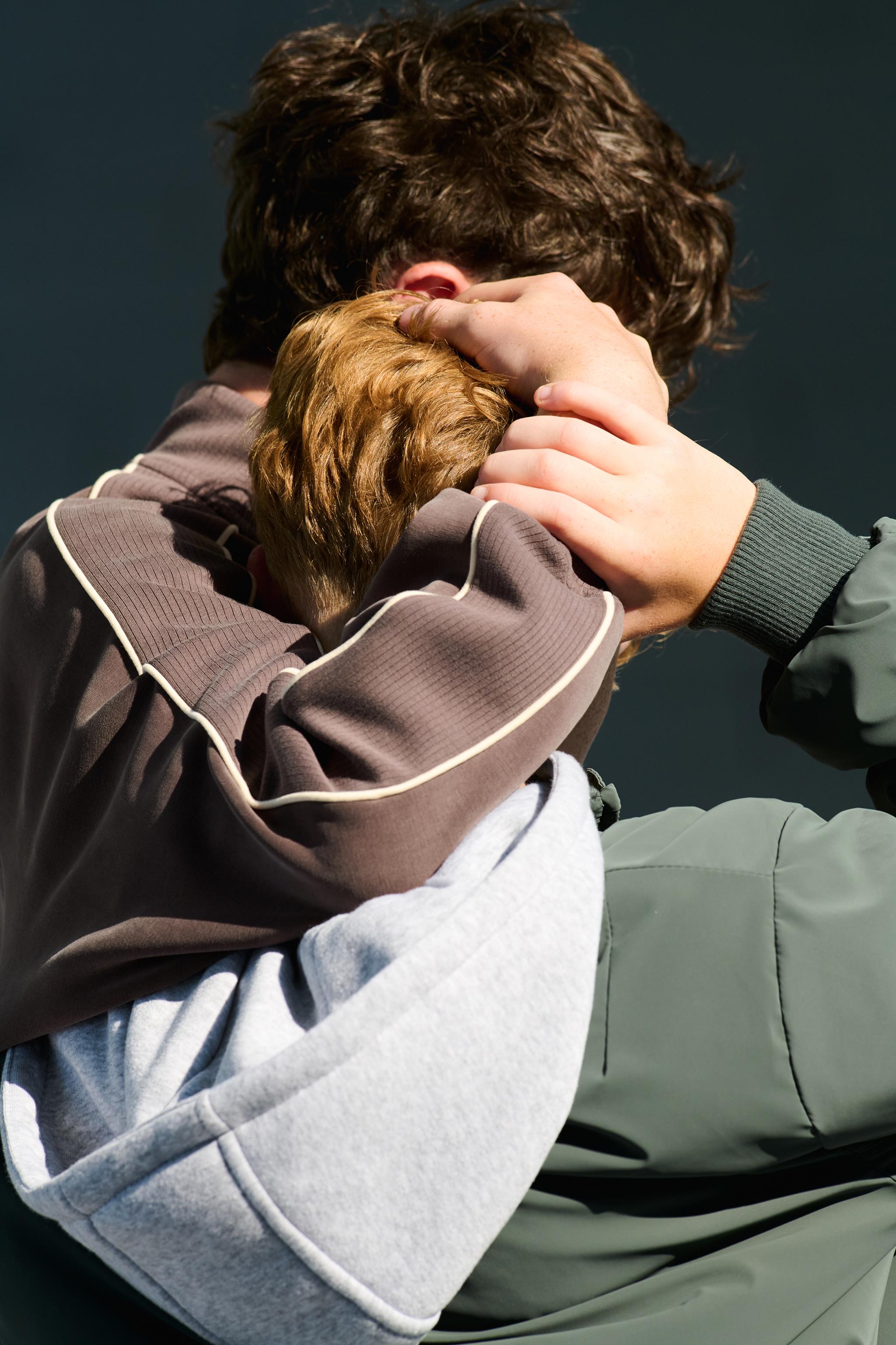 BLOUSON BOMBER GOMMÉ À CAPUCHE AMOVIBLE